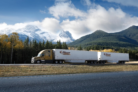 Bison Transport LCV driving on highway in Alberta