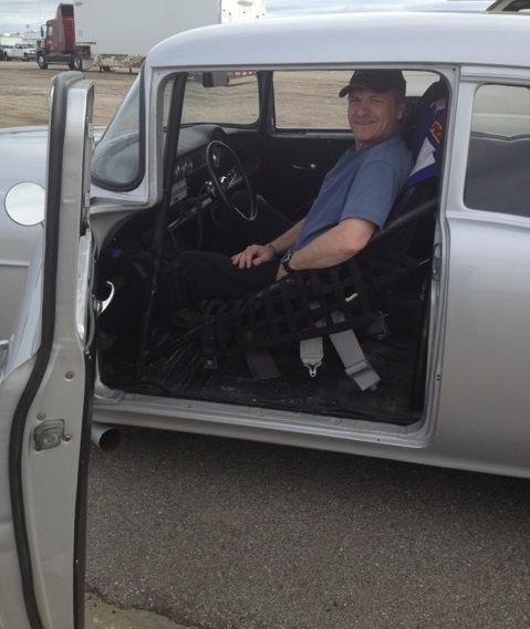 Randy Kuryk sitting in drag racing car